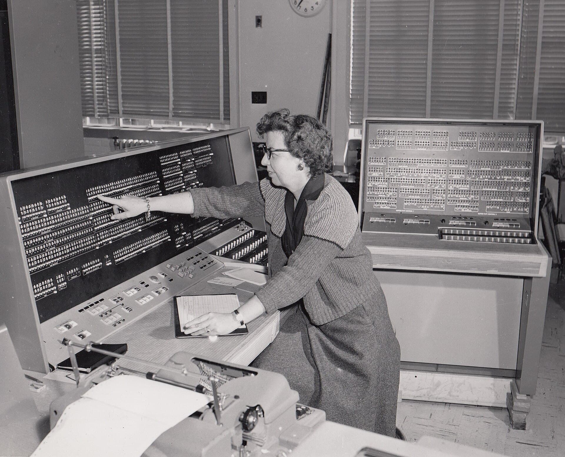 An operator at the console of the Census Bureau's UNIVAC 1105