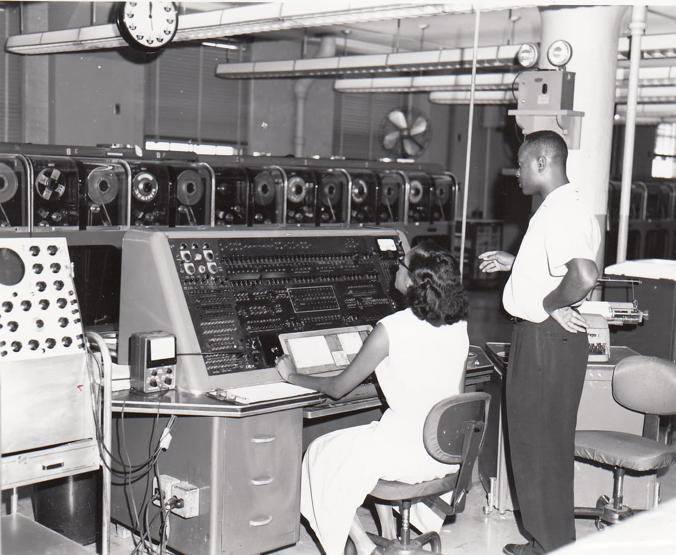 Two operators at the UNIVAC I console at the Census Bureau