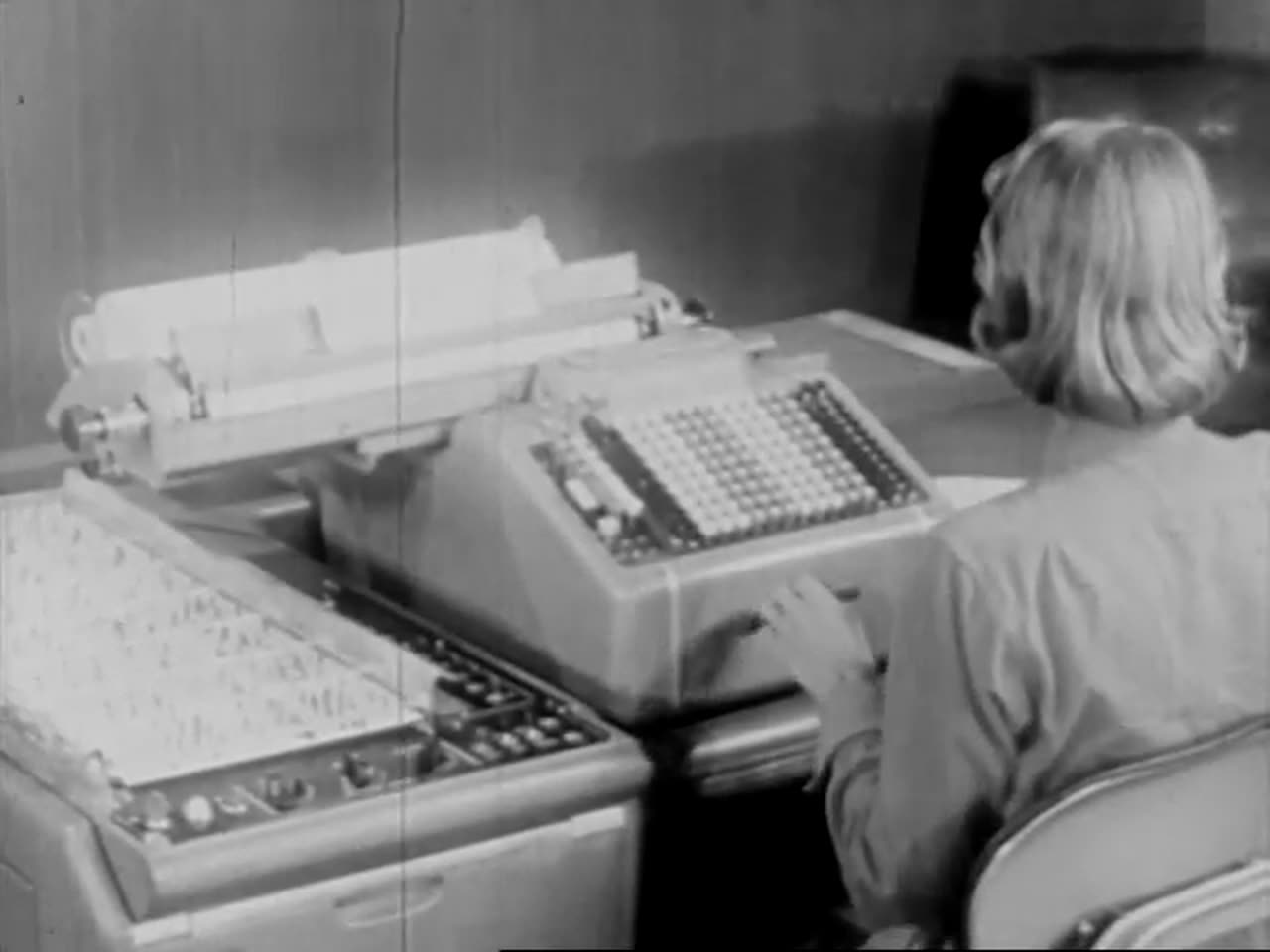 An operator at an electric accounting machine, 1957